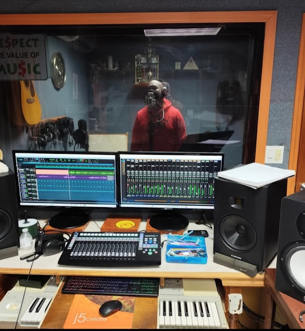 Farm Recording Studio recording booth — artist tracking vocals