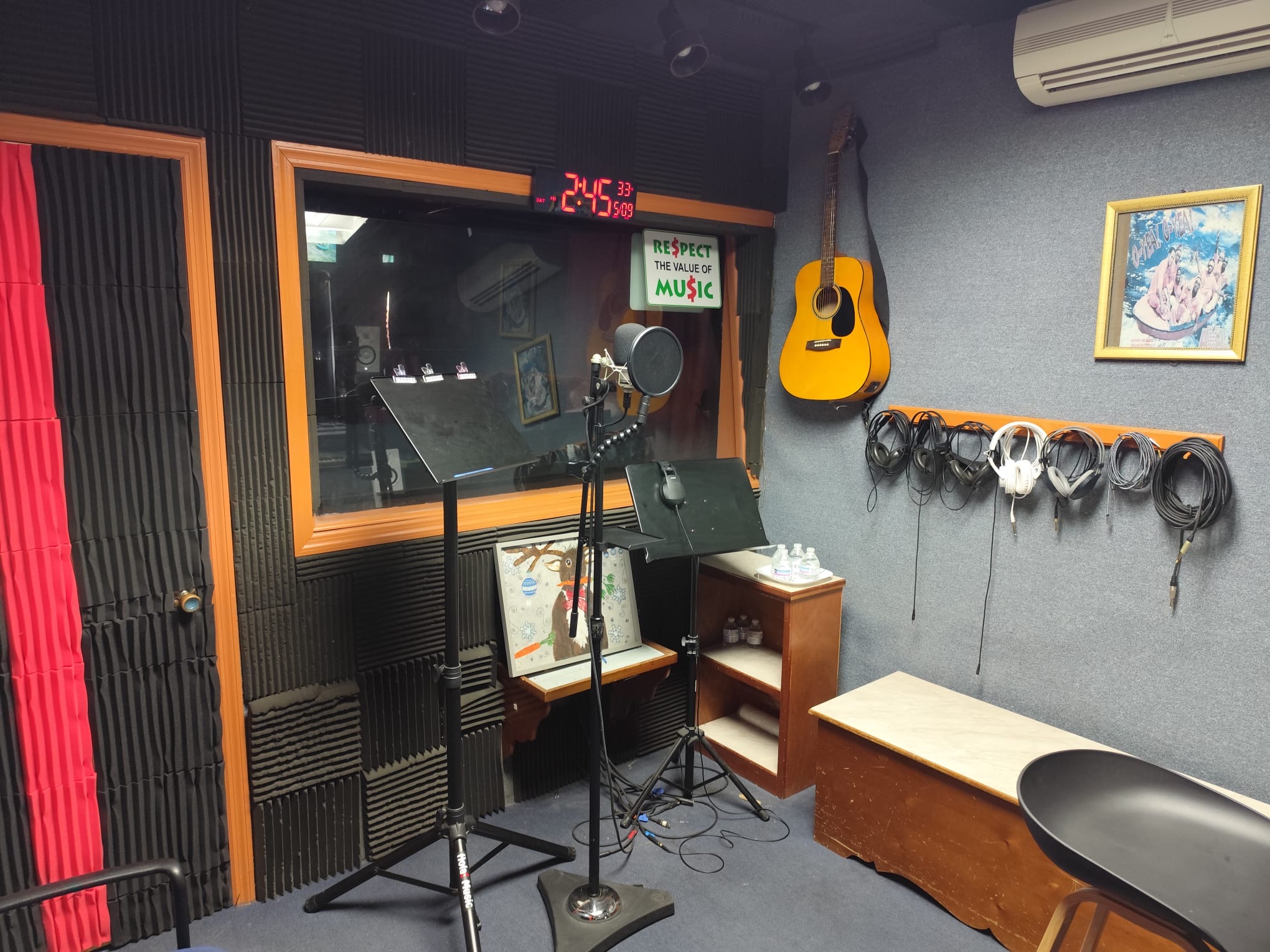 Farm Recording Studio live room vocal booth with microphone and guitar Anguilla